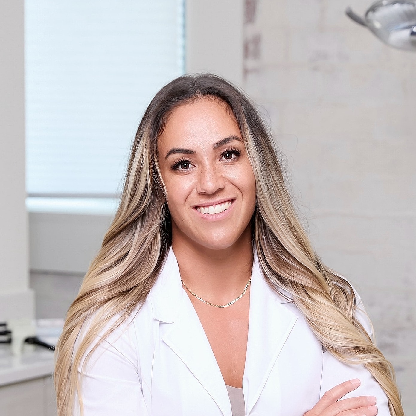 Smiling professional in a modern office setting.