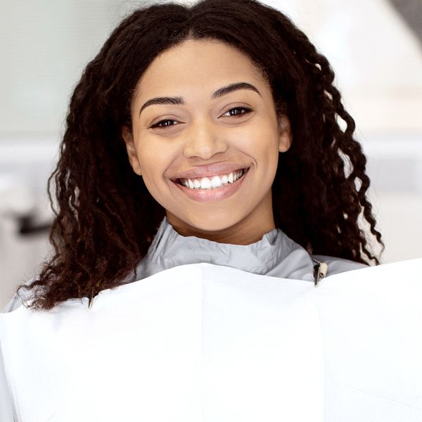 Smiling patient at a dental appointment.