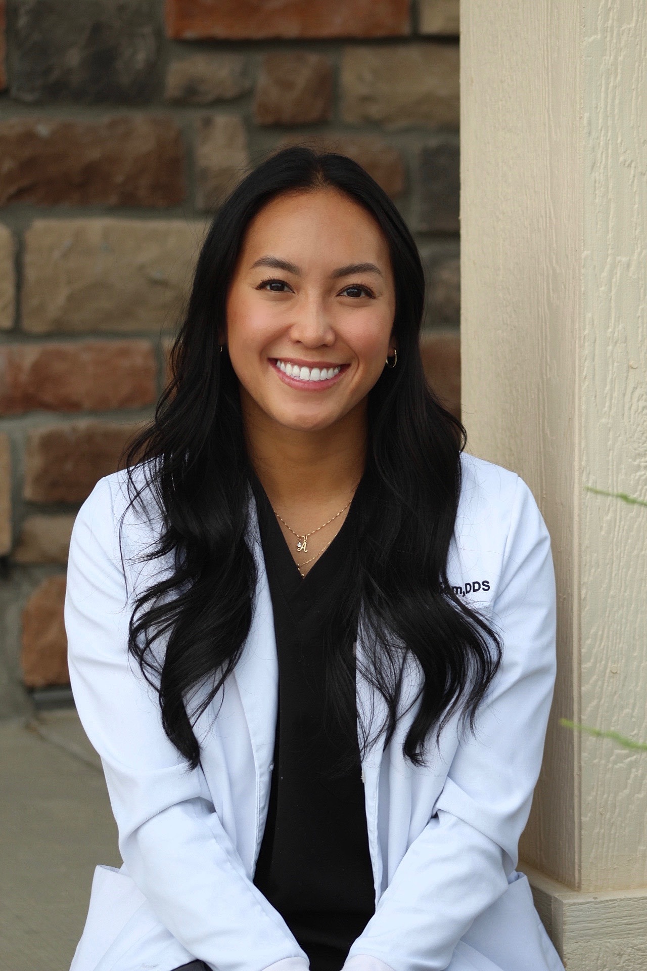 Couple walking hand-in-hand on the beach.
