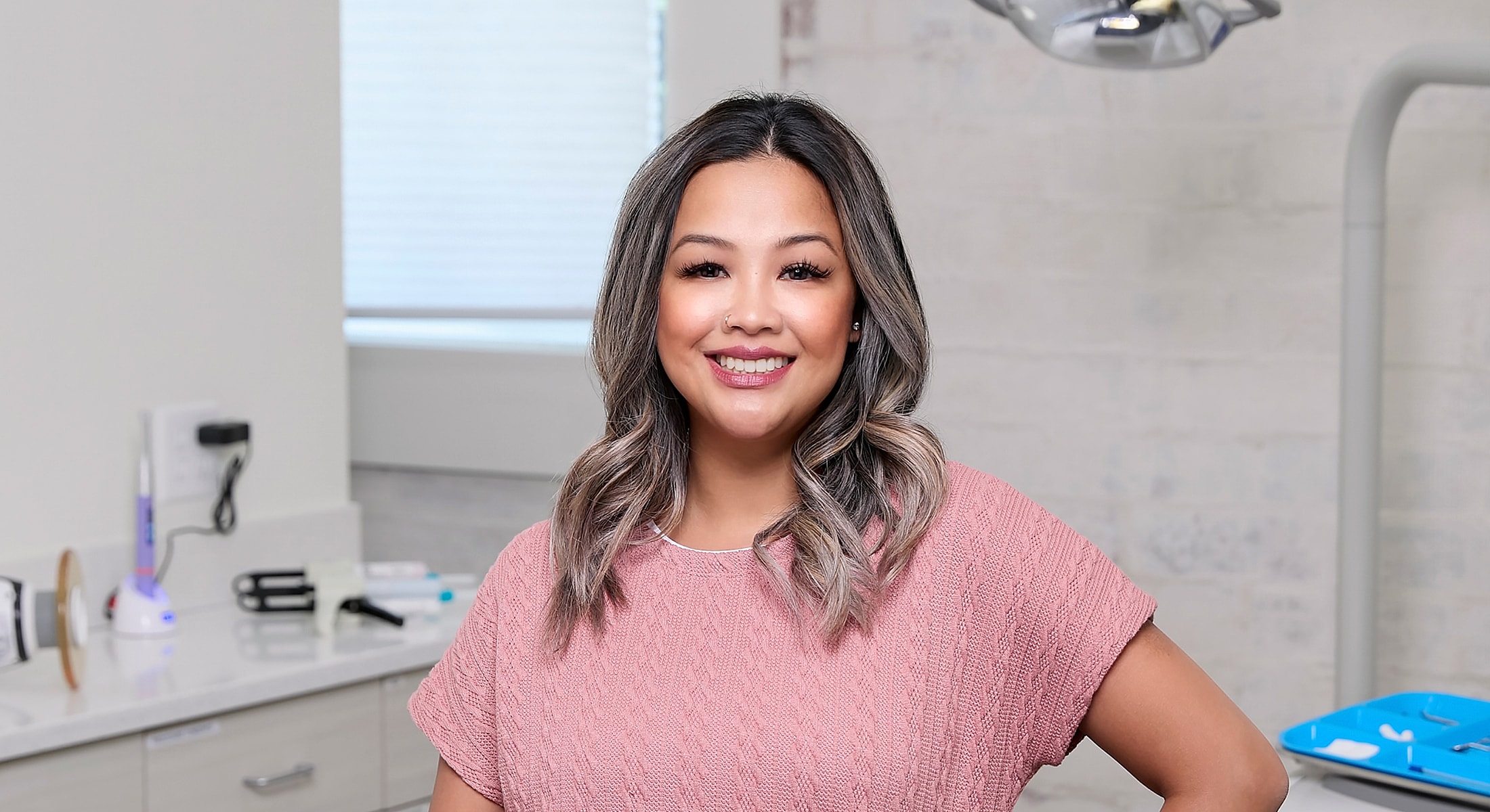 Snow-capped mountains with lake reflection and moon.