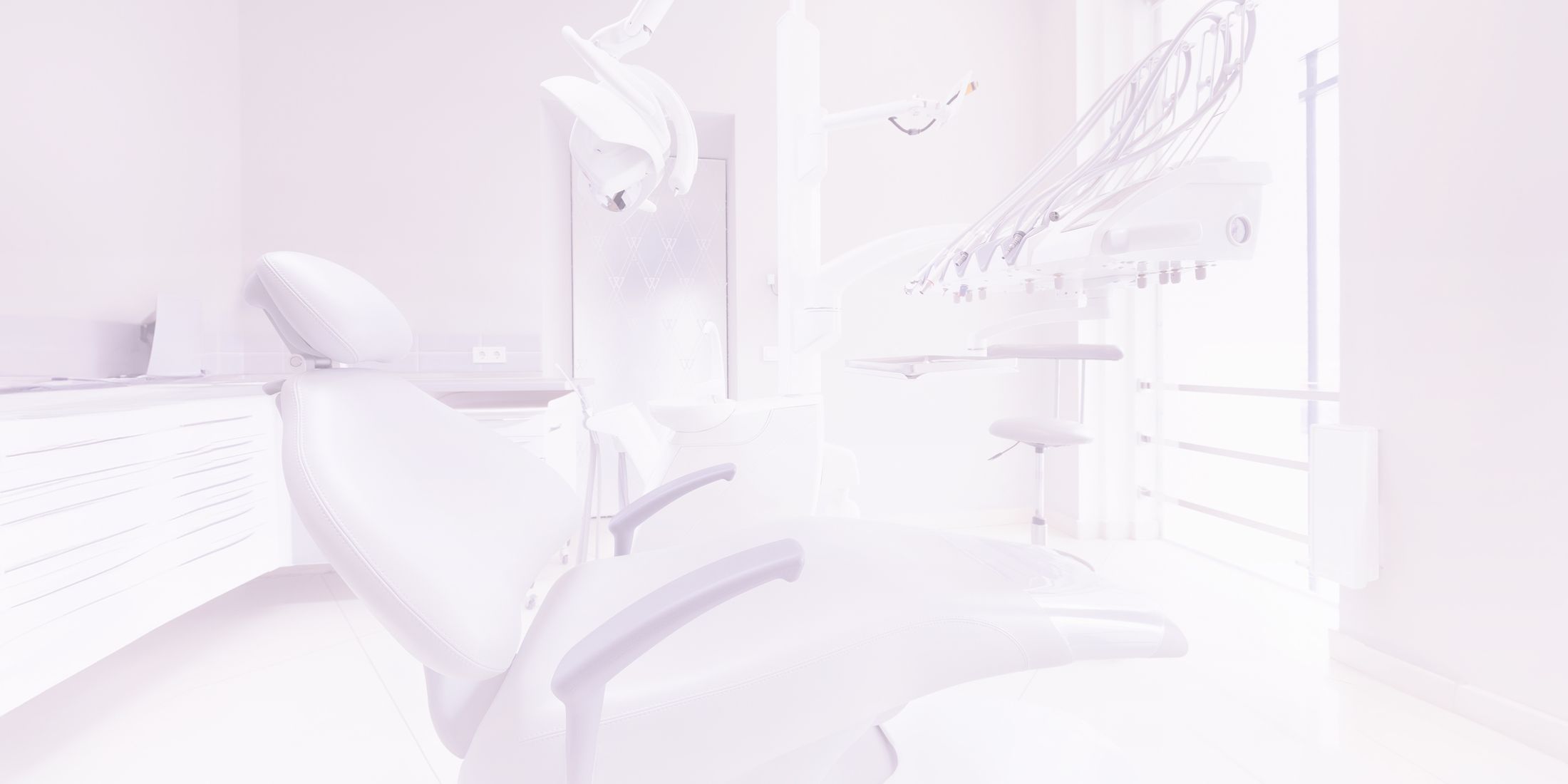 Dental clinic interior with equipment and chair.